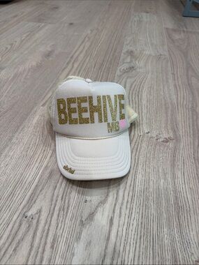 Beehive Cream Trucker Cap with Gold Glitter Logo